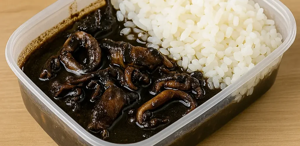 tupper de calamares en su tinta