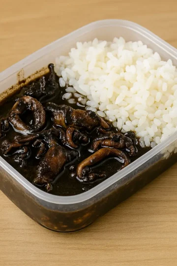 tupper de calamares en su tinta